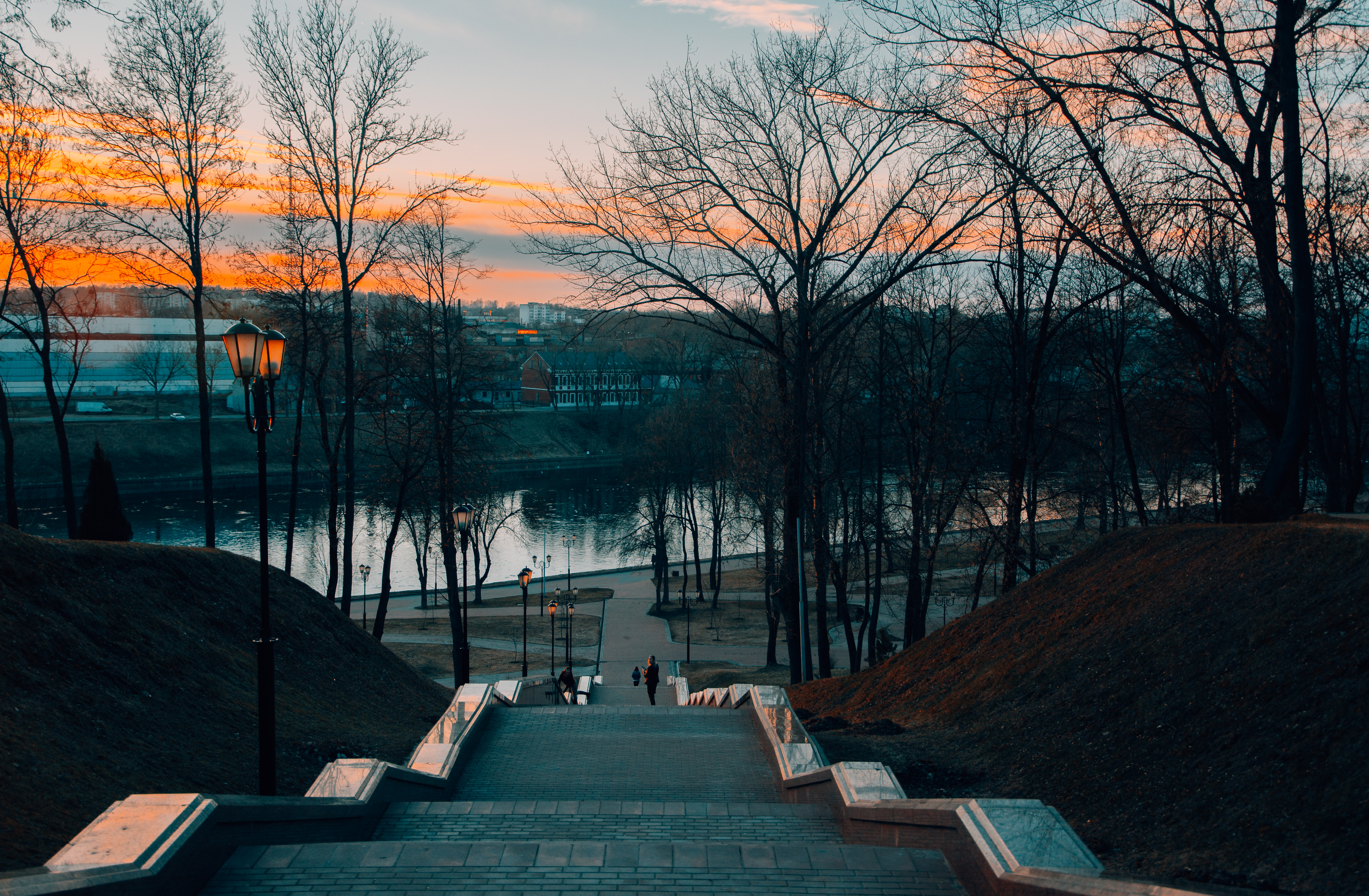 walkway in the city near a river