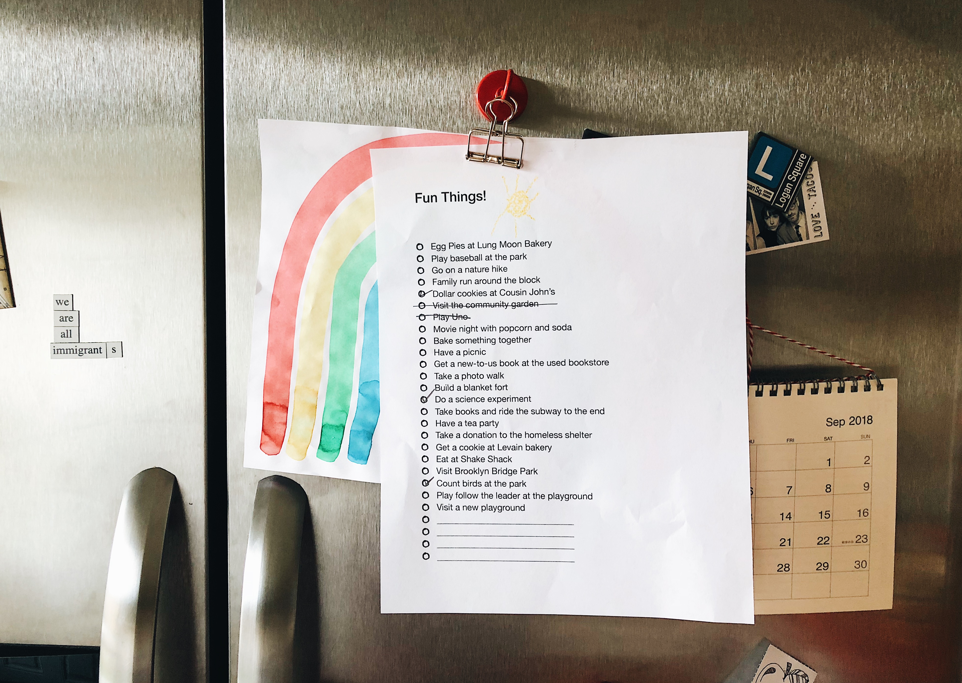 Fun things list hanging on fridge